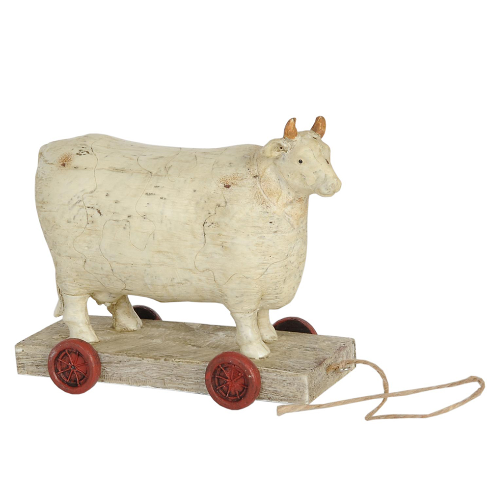 [6PR0034] Koe op wielen 14x7x12 cm