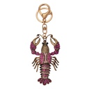 Porte-clés Couleur or Violet 5x2x9 cm