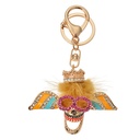 Sleutelhanger 5x2x7 cm goudkleurig